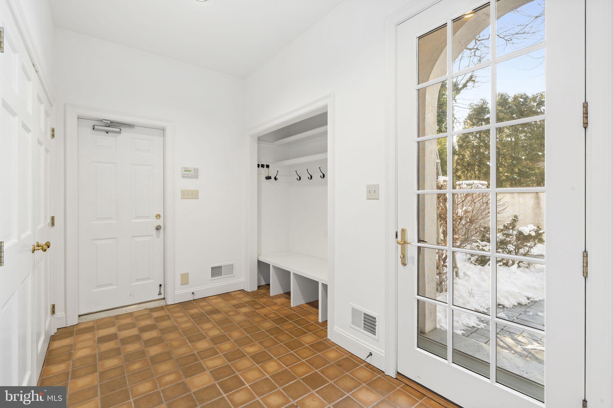 841 Mt Moro Road Villanova, PA 19085 - Photo 24 of 57 a view of a livingroom with wooden floor and a bathroom
