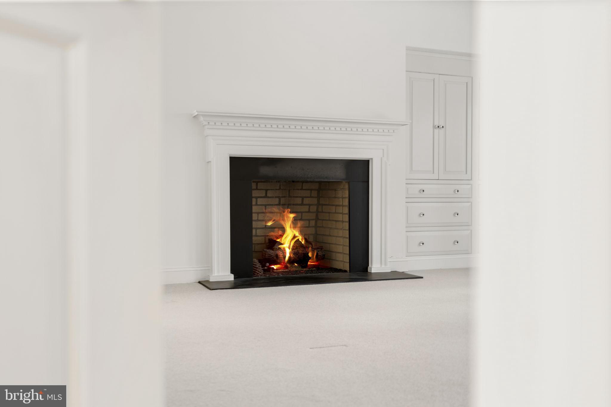 841 Mt Moro Road Villanova, PA 19085 - Photo 26 of 54 a living room with a fireplace
