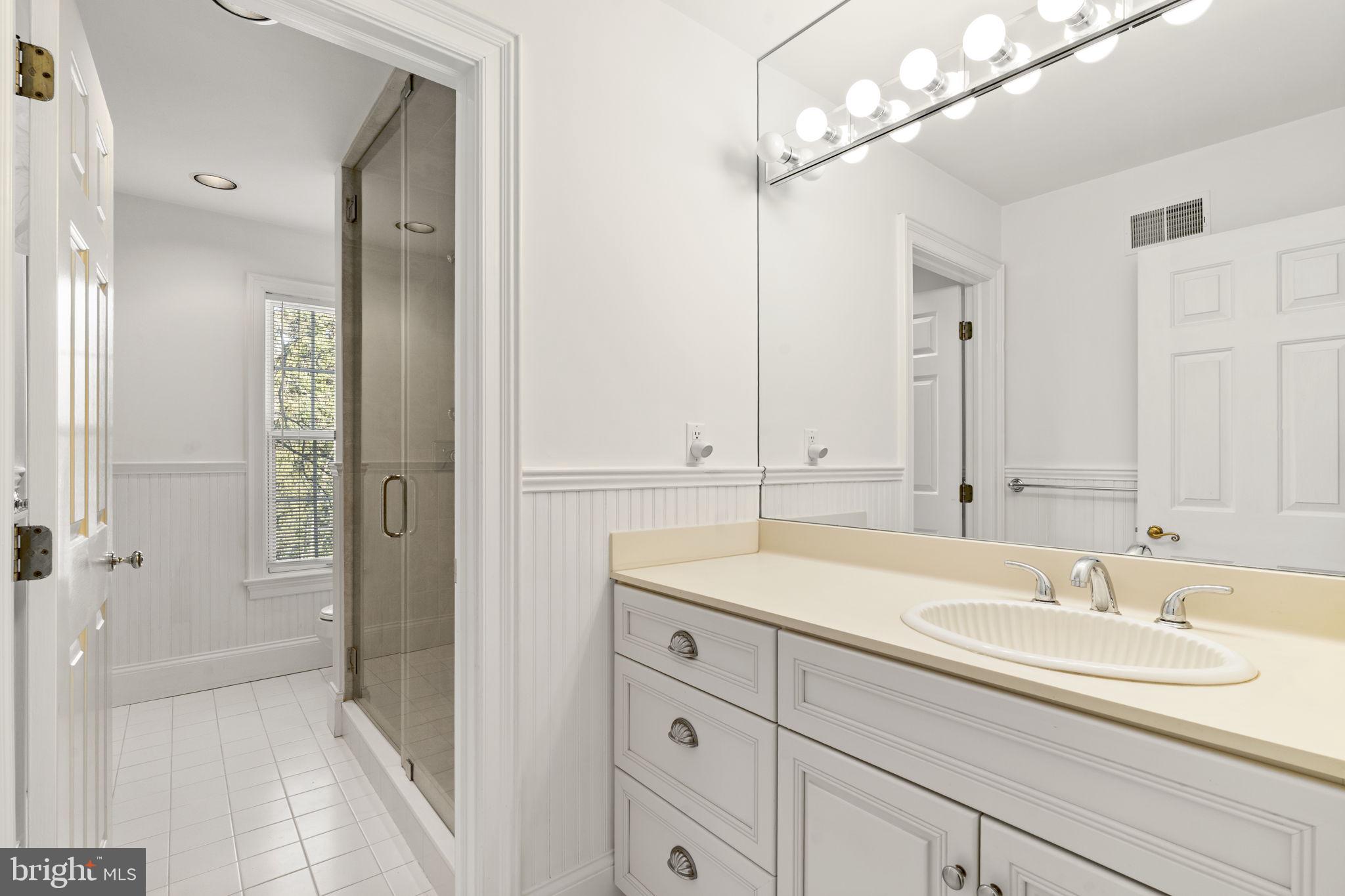 841 Mt Moro Road Villanova, PA 19085 - Photo 38 of 54 a bathroom with a sink double vanity and a mirror
