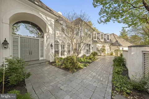 a view of front door with wooden floor