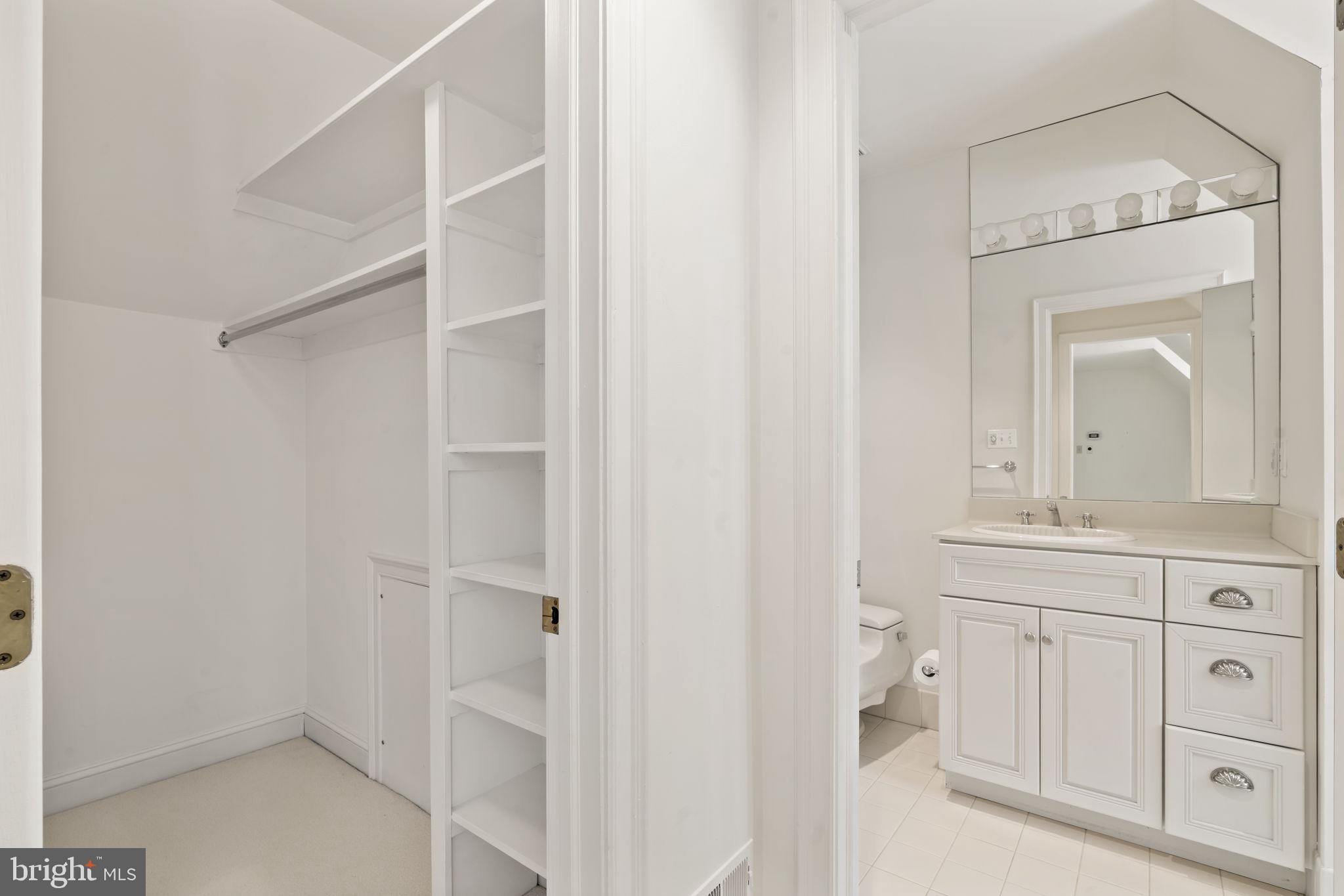 841 Mt Moro Road Villanova, PA 19085 - Photo 42 of 54 a spacious bathroom with a shower a mirror and a sink