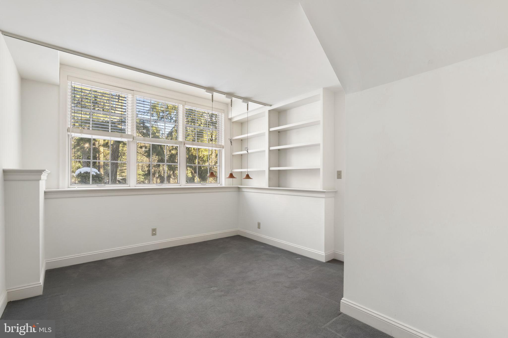 841 Mt Moro Road Villanova, PA 19085 - Photo 49 of 54 a room with window and cabinet