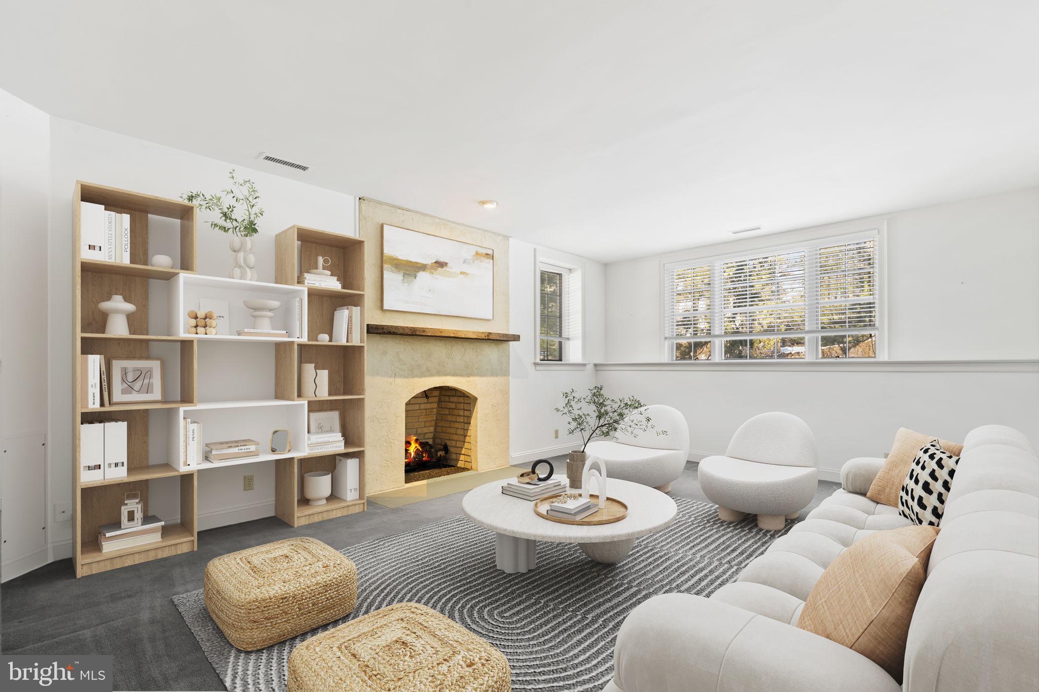 841 Mt Moro Road Villanova, PA 19085 - Photo 51 of 57 a living room with furniture and a fireplace