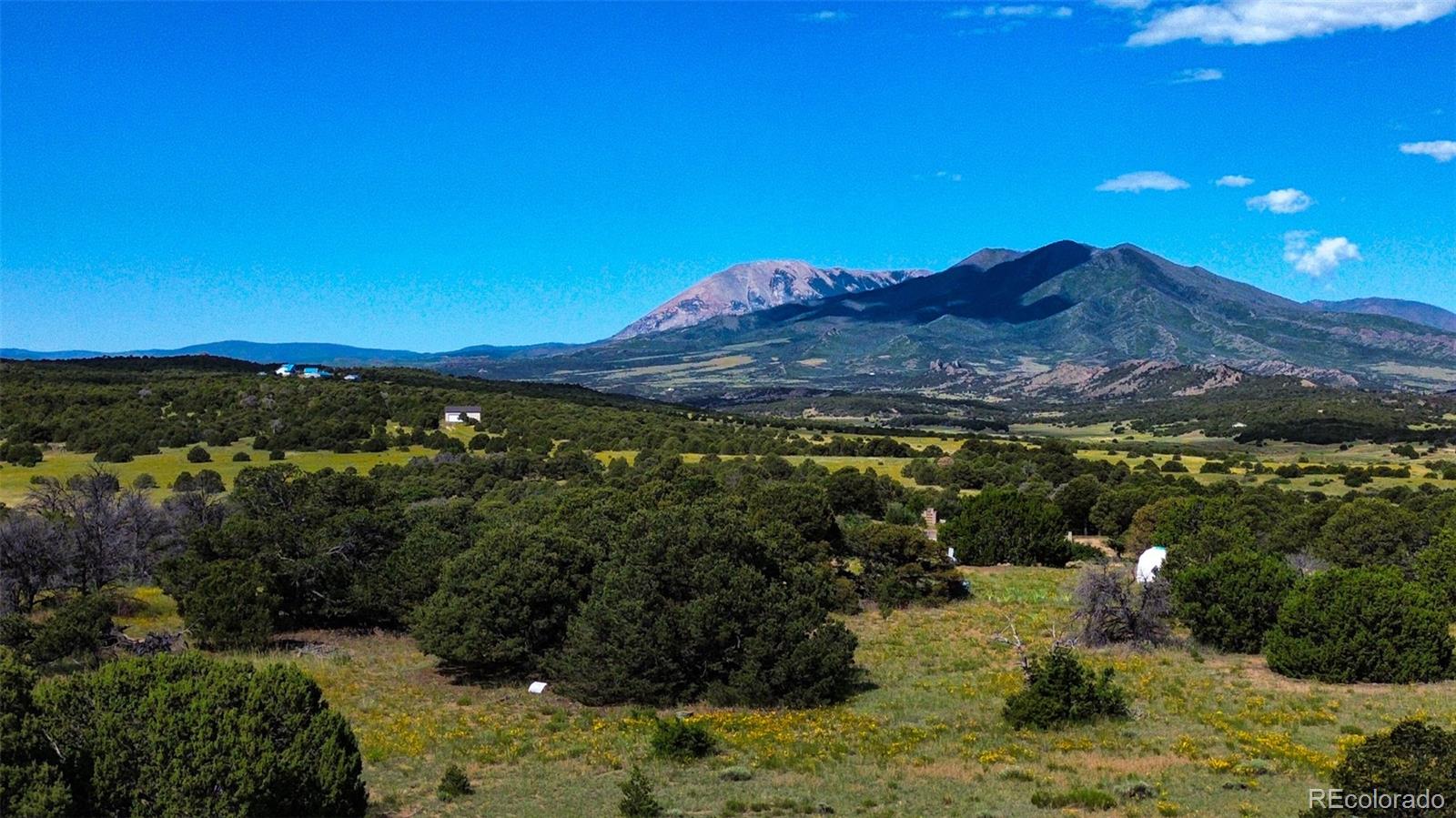 363 Black Hills Road Walsenburg, CO 81089 - Photo 1 of 30 a view of sunset and mountains
