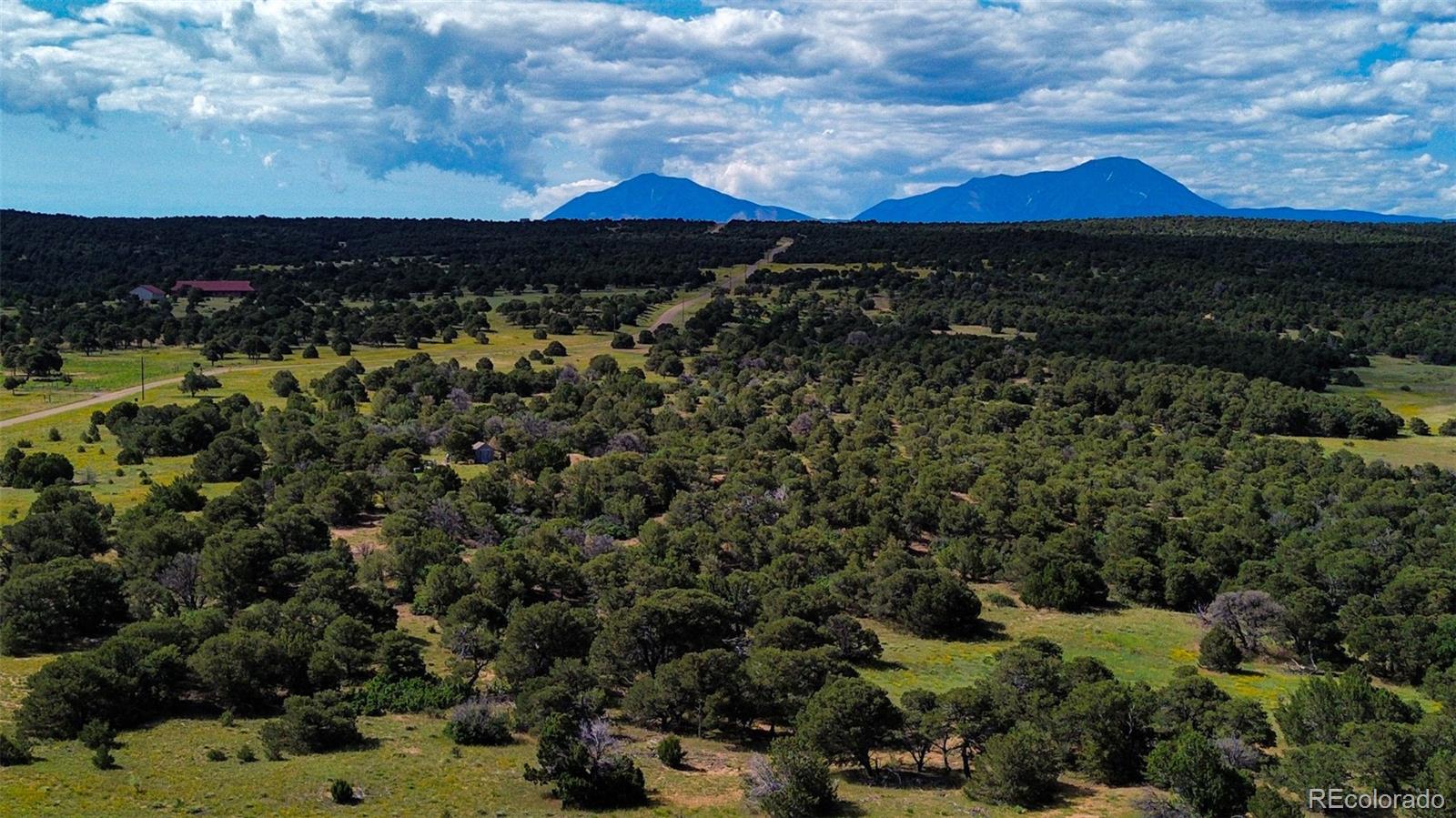 363 Black Hills Road Walsenburg, CO 81089 - Photo 12 of 30 a view of a city with mountain