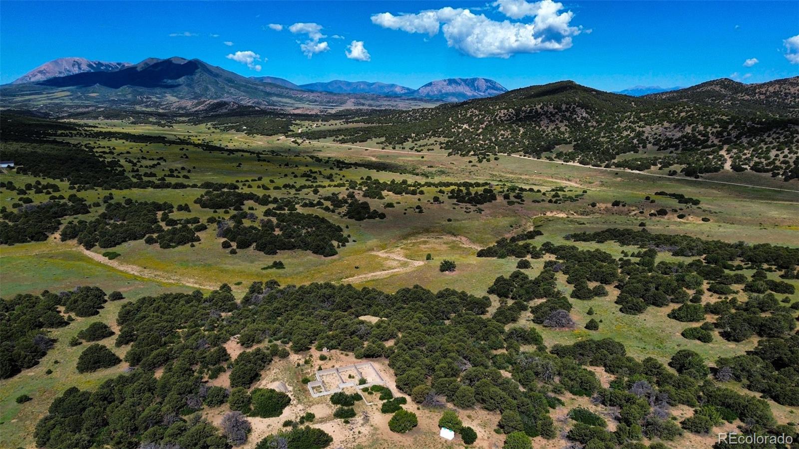 363 Black Hills Road Walsenburg, CO 81089 - Photo 2 of 30 a view of a houses with a yard
