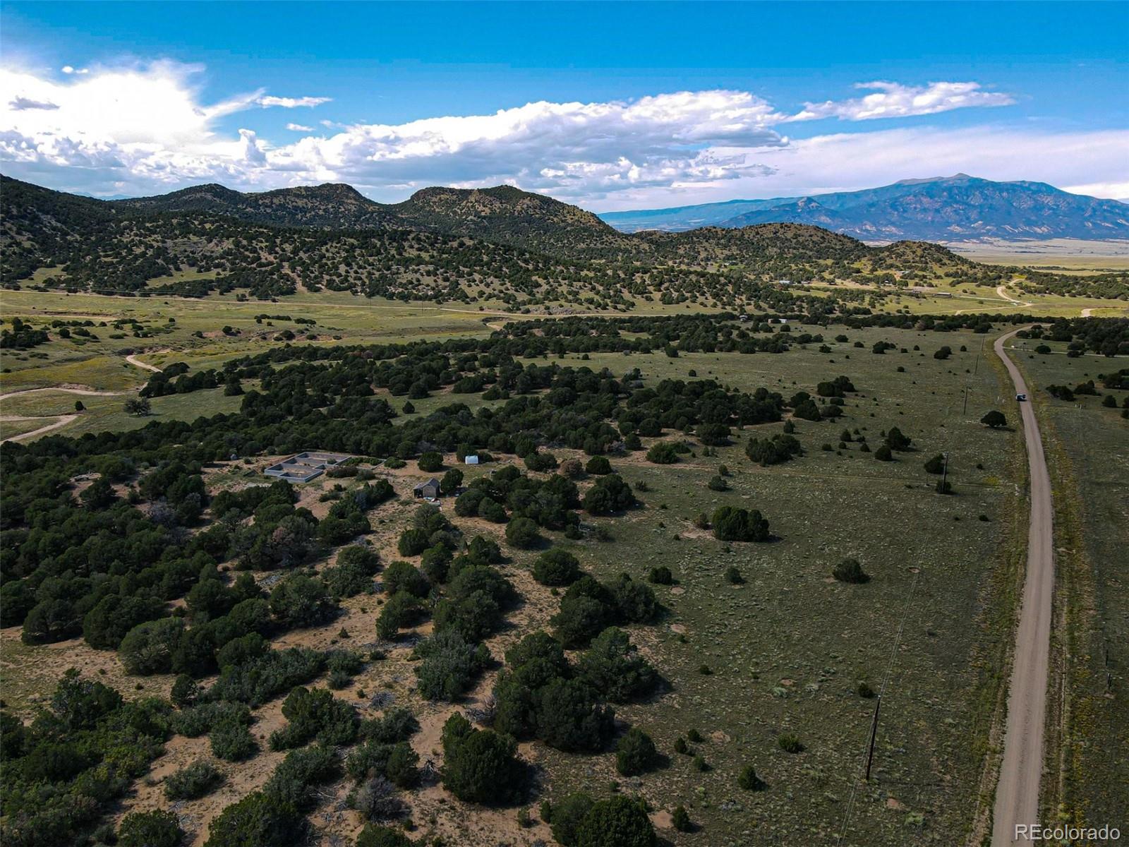 363 Black Hills Road Walsenburg, CO 81089 - Photo 23 of 30 a view of a city with sunset
