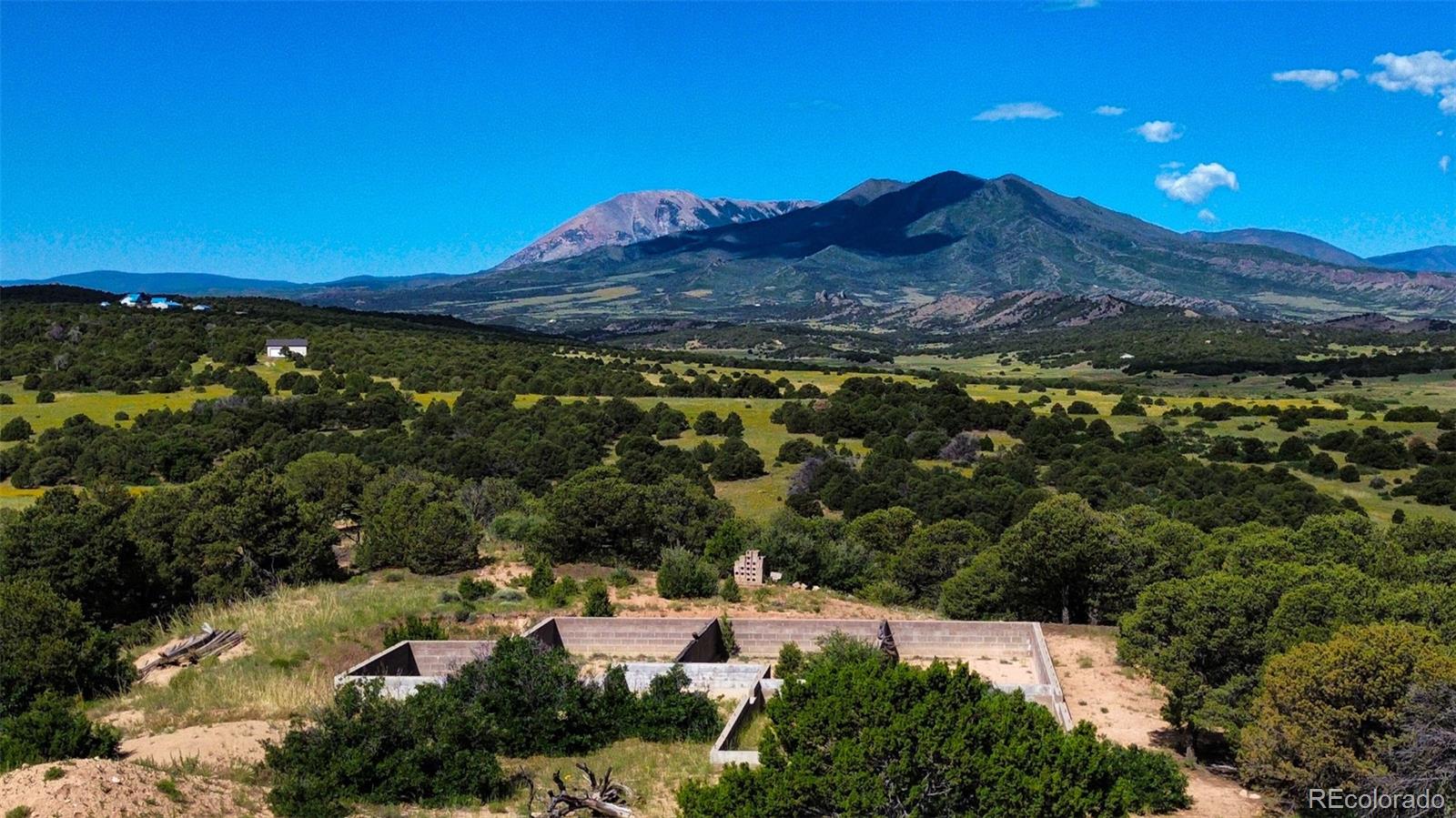 363 Black Hills Road Walsenburg, CO 81089 - Photo 3 of 30 a view of a city with mountains in the background