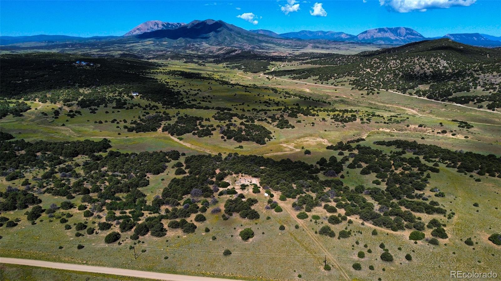 363 Black Hills Road Walsenburg, CO 81089 - Photo 6 of 30 a view of a lake with a mountain