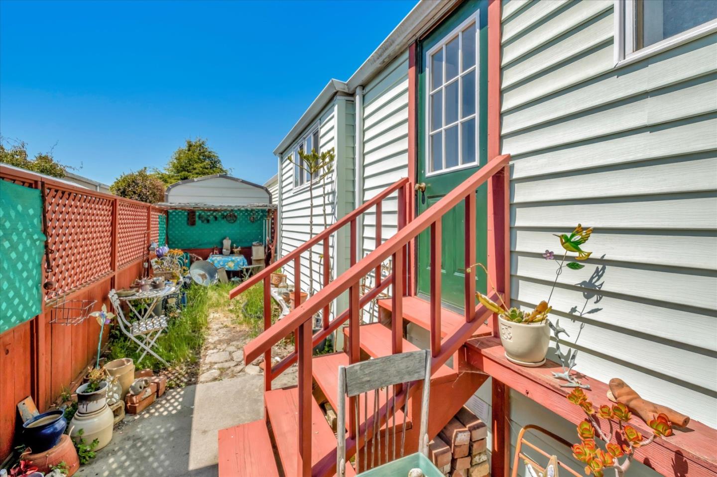 4160 Jade Street, Unit 74 Capitola, CA 95010 - Photo 22 of 25 a front view of a house with a yard