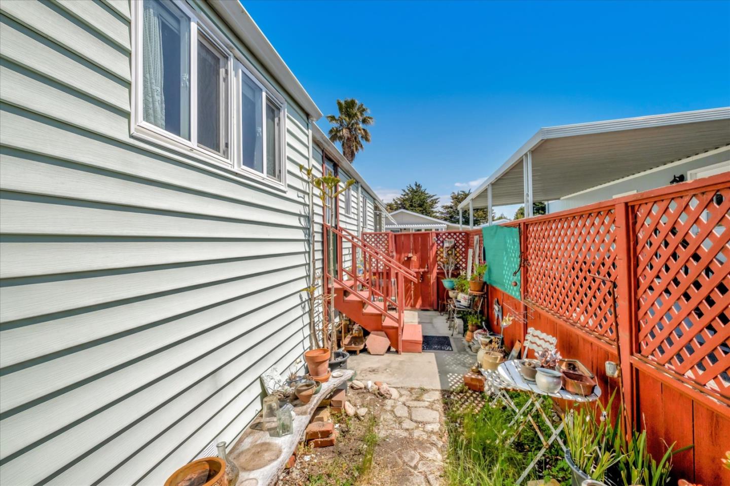 4160 Jade Street, Unit 74 Capitola, CA 95010 - Photo 23 of 25 a view of a pathway with a backyard