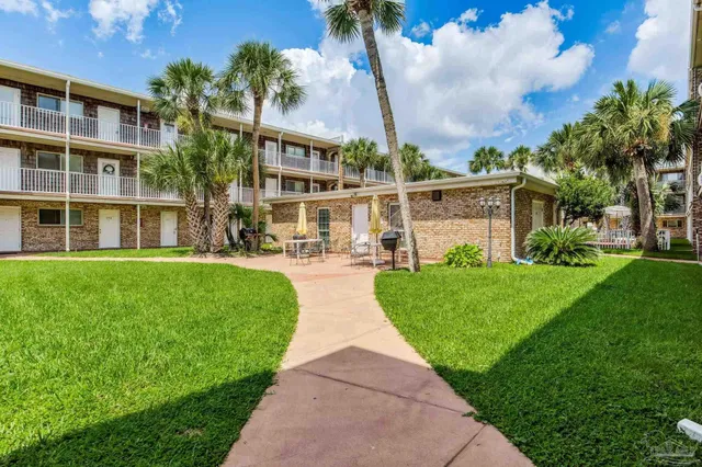 a view of a building with garden