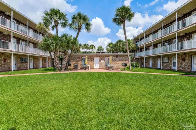 a view of building with yard