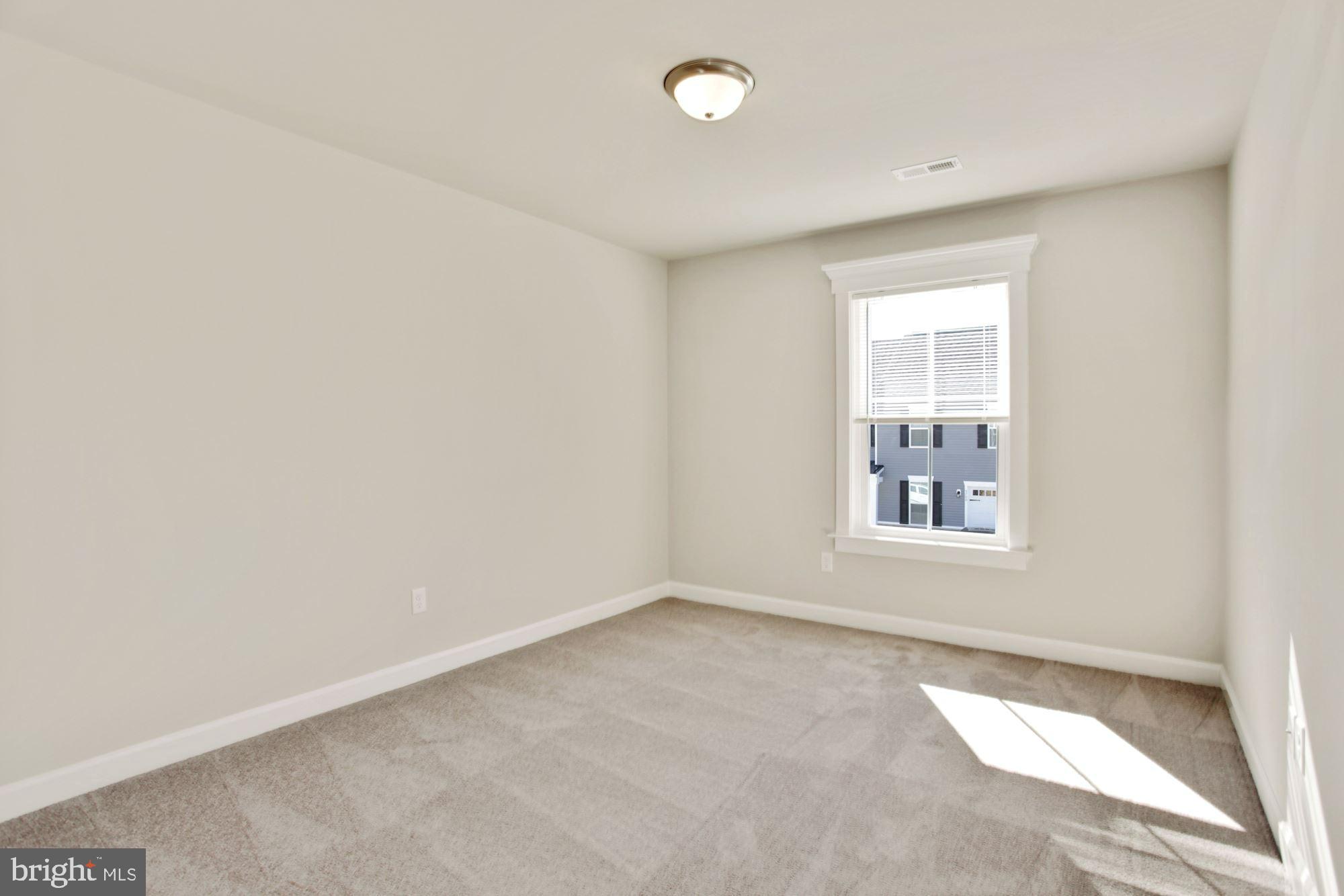 5606 Finley Rose Court Fredericksburg, VA 22407 - Photo 14 of 23 an empty room with a window