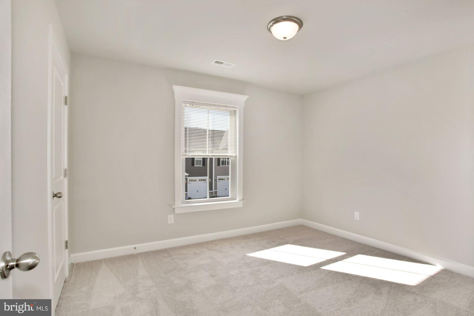 5606 Finley Rose Court Fredericksburg, VA 22407 - Photo 15 of 23 an empty room with windows