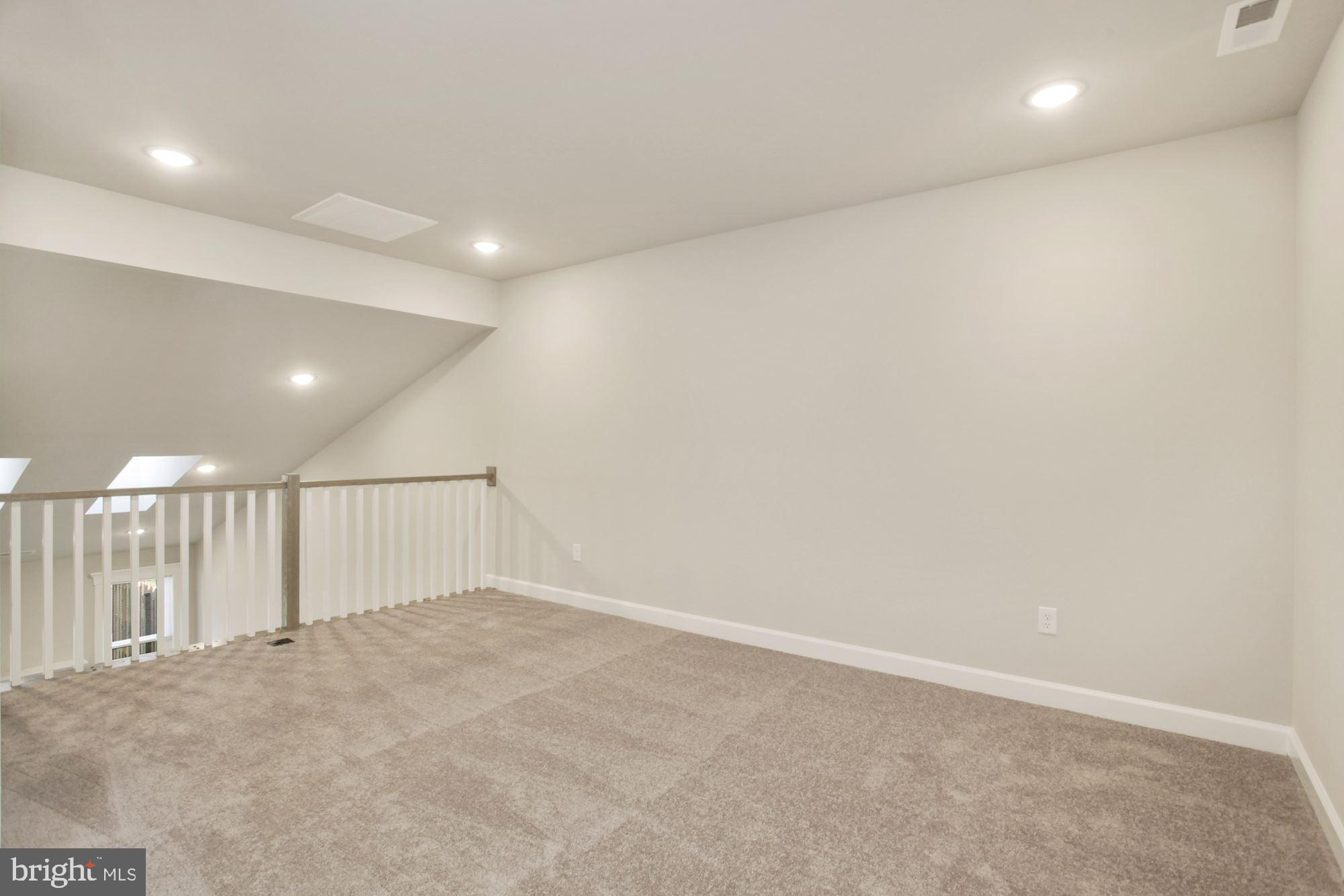 5606 Finley Rose Court Fredericksburg, VA 22407 - Photo 17 of 23 an empty room with wooden floor