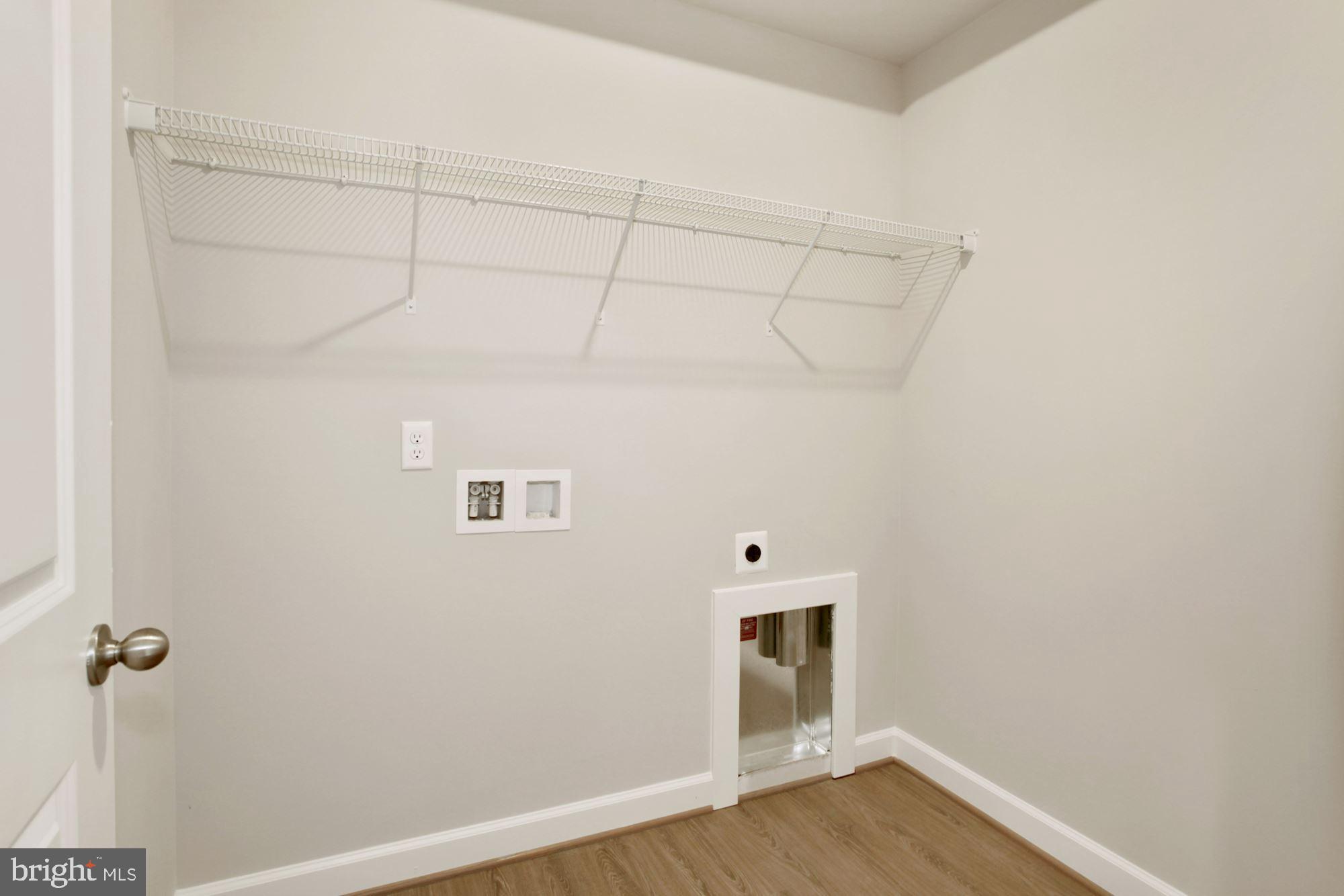 5606 Finley Rose Court Fredericksburg, VA 22407 - Photo 9 of 23 a view of a room with wooden floor