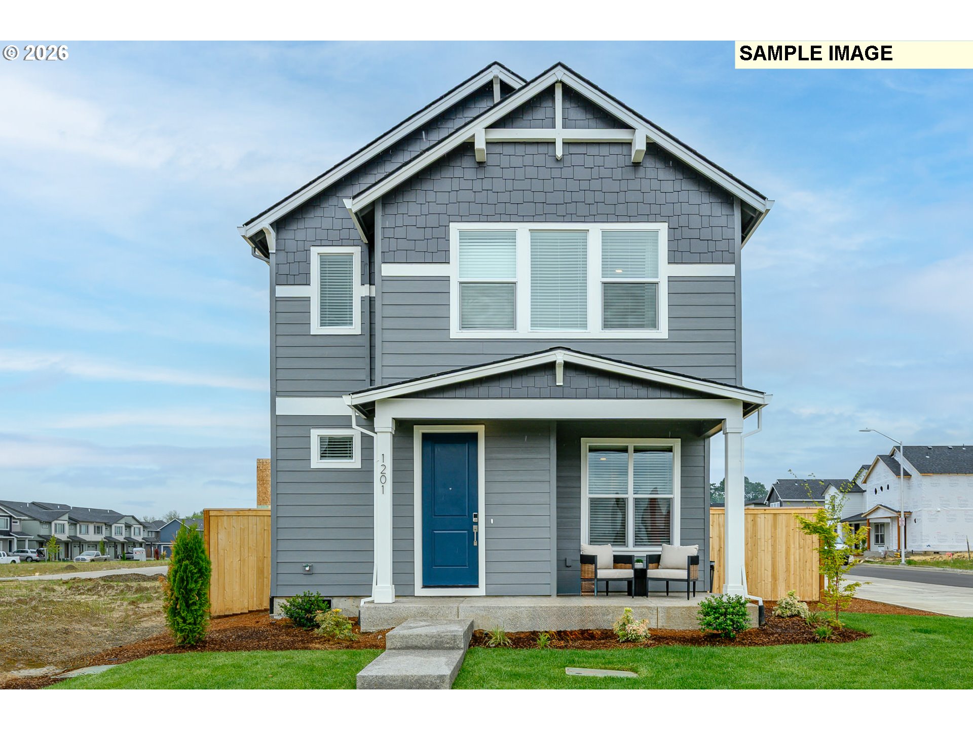 3159 South Kodiak Street, Unit L797 Cornelius, OR 97113 - Photo 1 of 18 a front view of a house with garden
