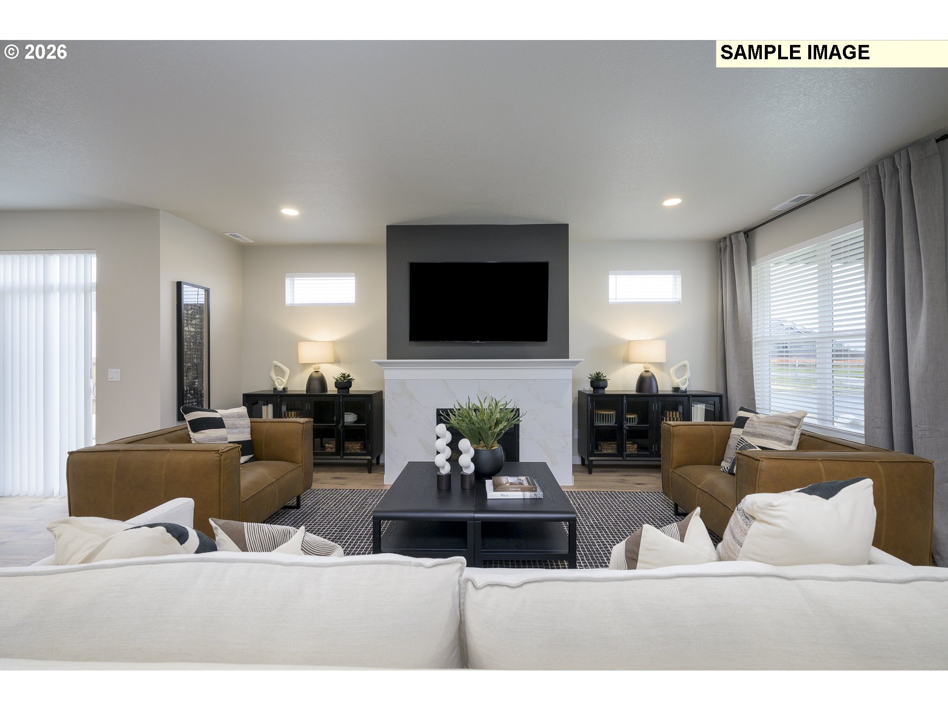 3159 South Kodiak Street, Unit L797 Cornelius, OR 97113 - Photo 4 of 18 a living room with furniture and a flat screen tv