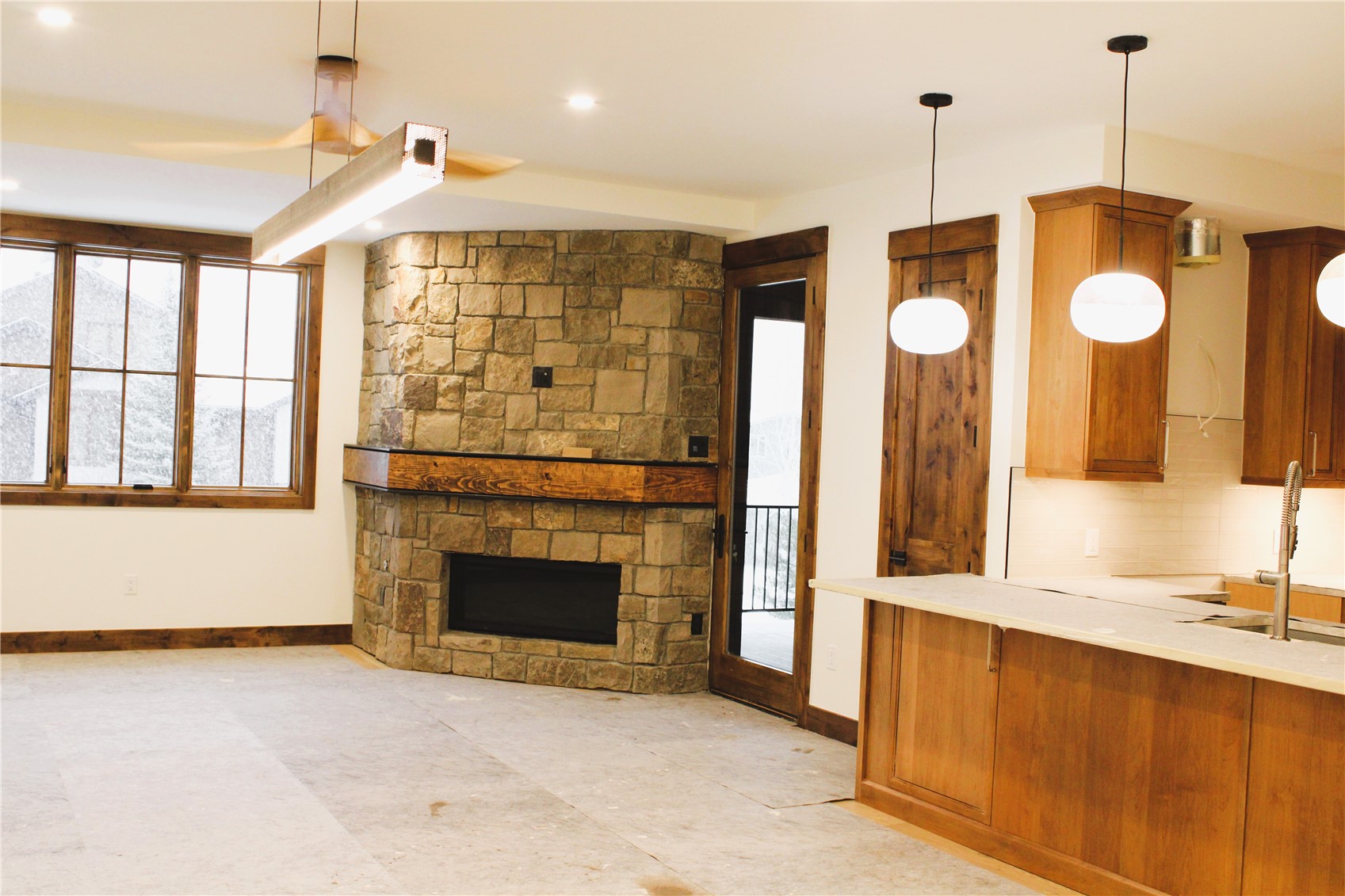 302 Teller Street, Unit 4 Frisco, CO 80443 - Photo 11 of 17 a view of a kitchen with a sink and wooden floor