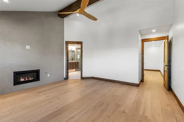 a view of a roof with wooden floor and a yard