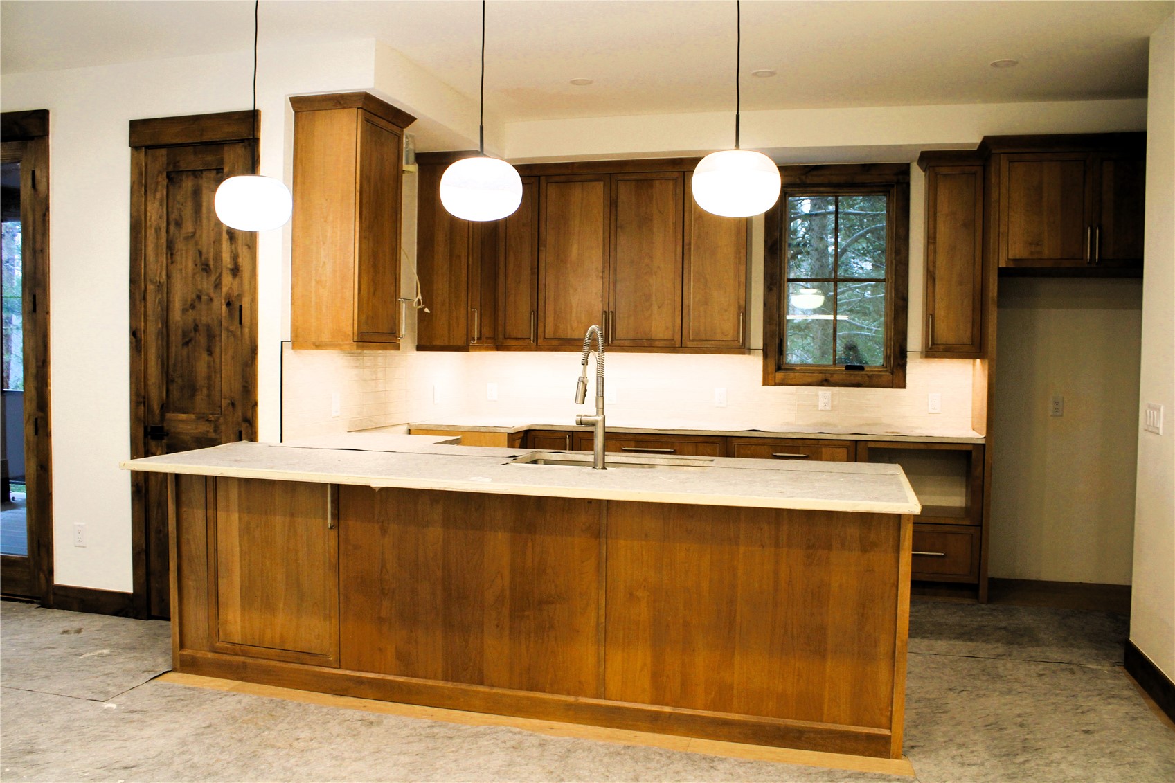 302 Teller Street, Unit 4 Frisco, CO 80443 - Photo 8 of 17 a view of a kitchen with a sink and window