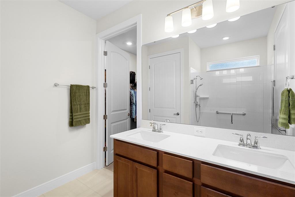 2024 Canopy Terrace Boulevard DeLand, FL 32724 - Photo 16 of 25 a bathroom with a sink and a mirror
