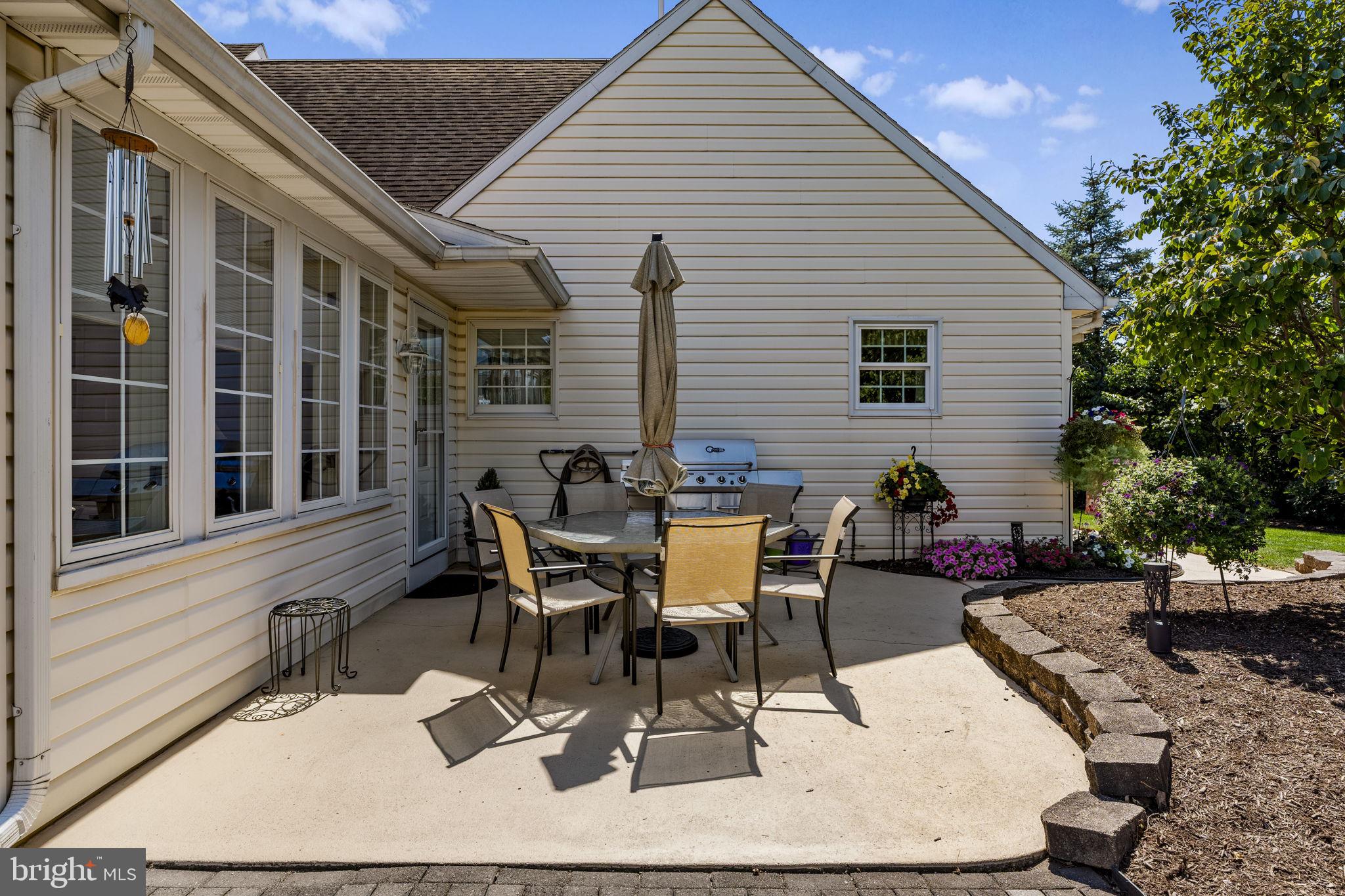 4 Eagle Circle Denver, PA 17517 - Photo 12 of 61 a view of a patio with table and chairs and potted plants
