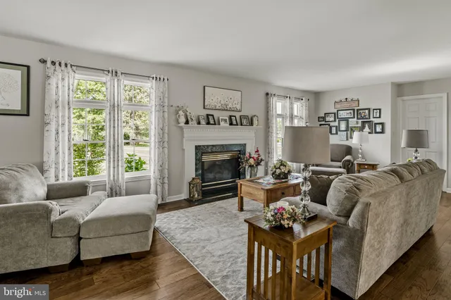 a kitchen with stainless steel appliances a refrigerator sink and cabinets
