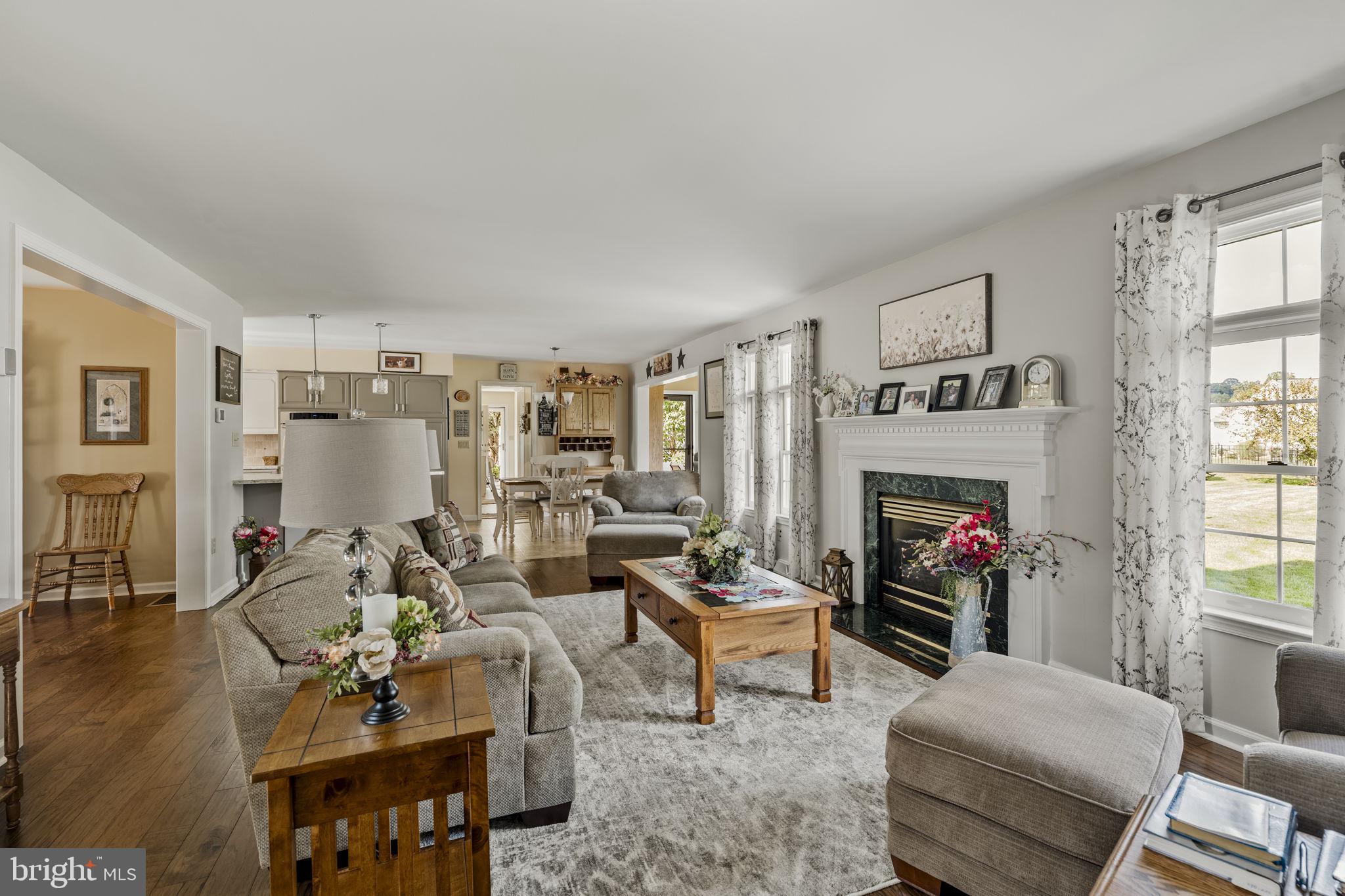 4 Eagle Circle Denver, PA 17517 - Photo 26 of 61 a living room with furniture a fireplace and a window