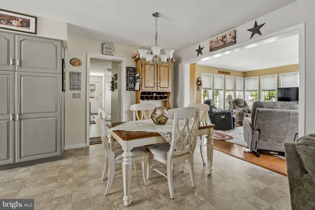 a bed room with a bed and a dresser