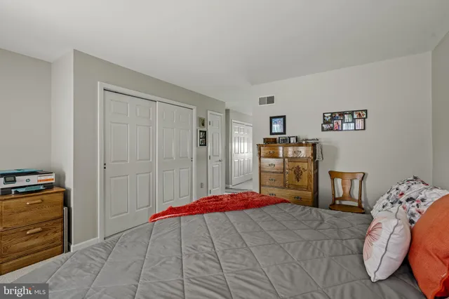 a bathroom with a shower and a toilet