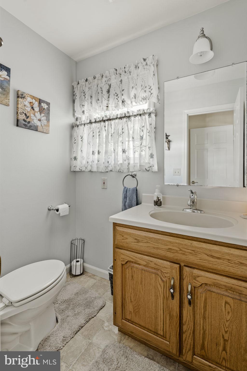 4 Eagle Circle Denver, PA 17517 - Photo 43 of 61 a bathroom with a toilet sink and mirror