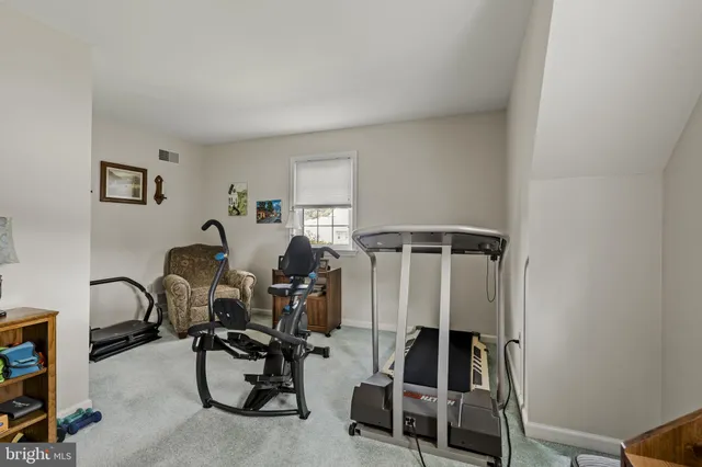 a view of parking garage with cars