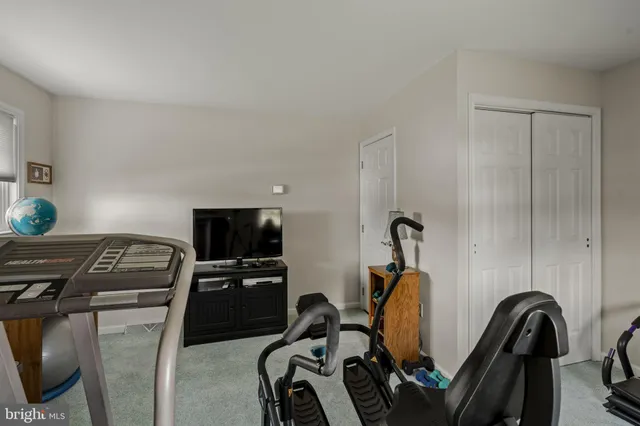 a picture of a bathroom with a shower