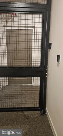 a view of street sign on a sidewalk