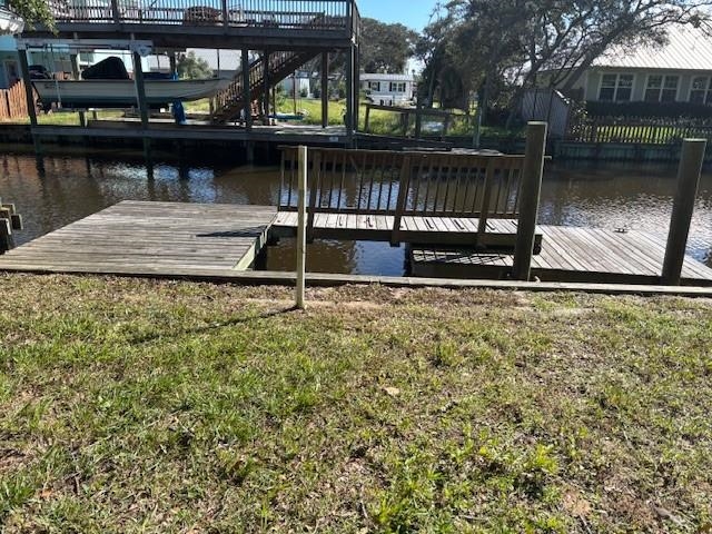 237 Basque Road St. Augustine, FL 32080 - Photo 1 of 13 Dock with a water view and a yard