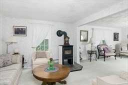 149 Broad Street Barre, MA 01005 - Photo 16 of 34 a living room with furniture and a fireplace