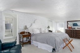 149 Broad Street Barre, MA 01005 - Photo 21 of 34 a bedroom with a bed and a dresser with mirror