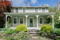 149 Broad Street Barre, MA 01005 - Photo 30 of 34 a view of a brick house with a large window and a yard