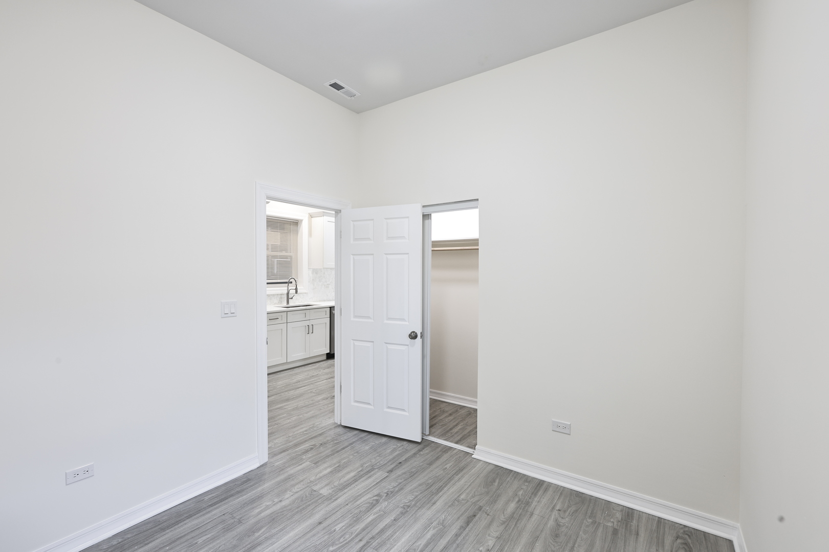 3621 South Winchester Avenue, Unit 1 Chicago, IL 60609 - Photo 15 of 24 a view of empty room with wooden floor