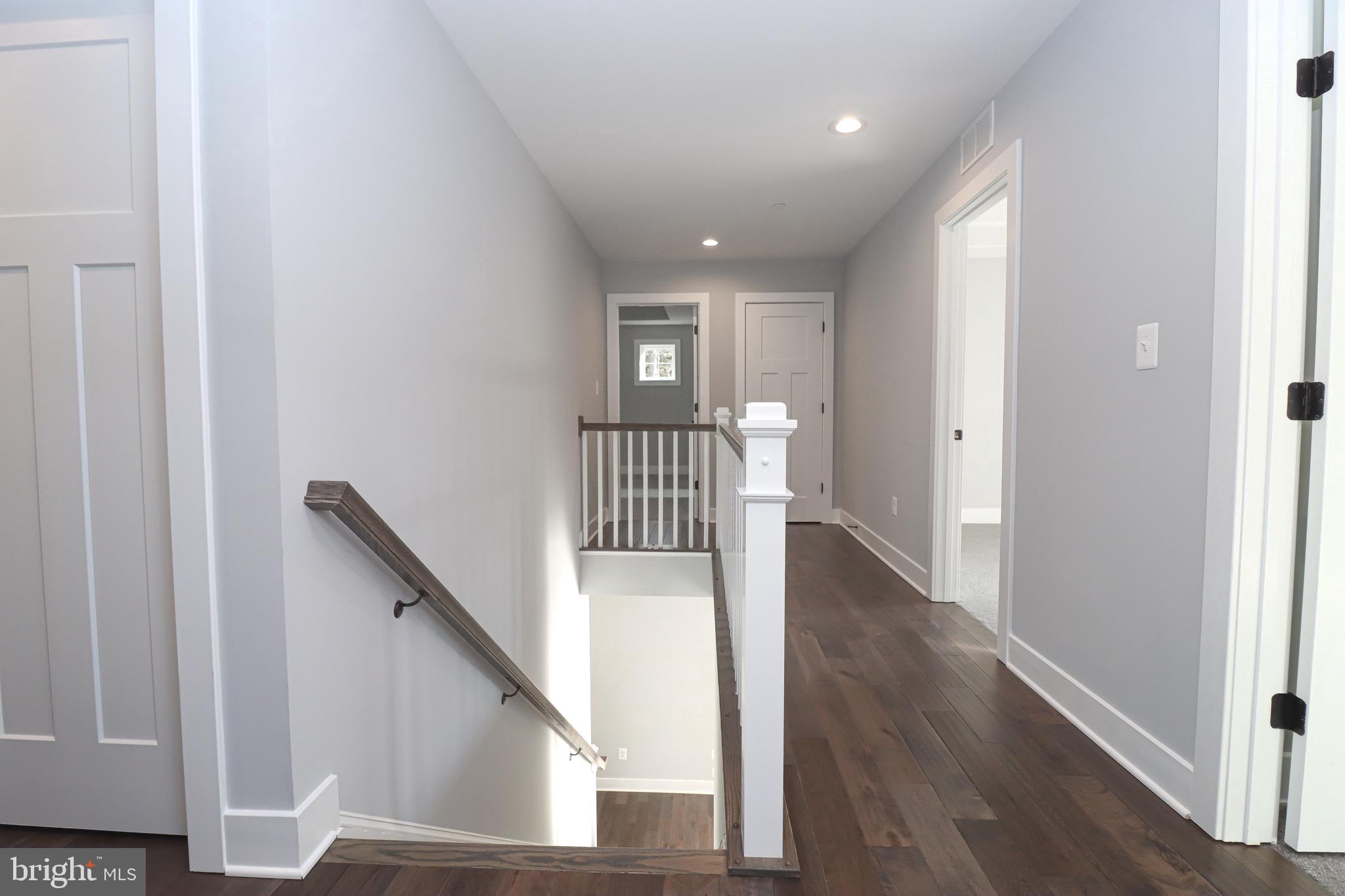 1305 Polyanski Drive Pasadena, MD 21122 - Photo 17 of 50 Hardwoods in Upper Level Hallway & Laundry