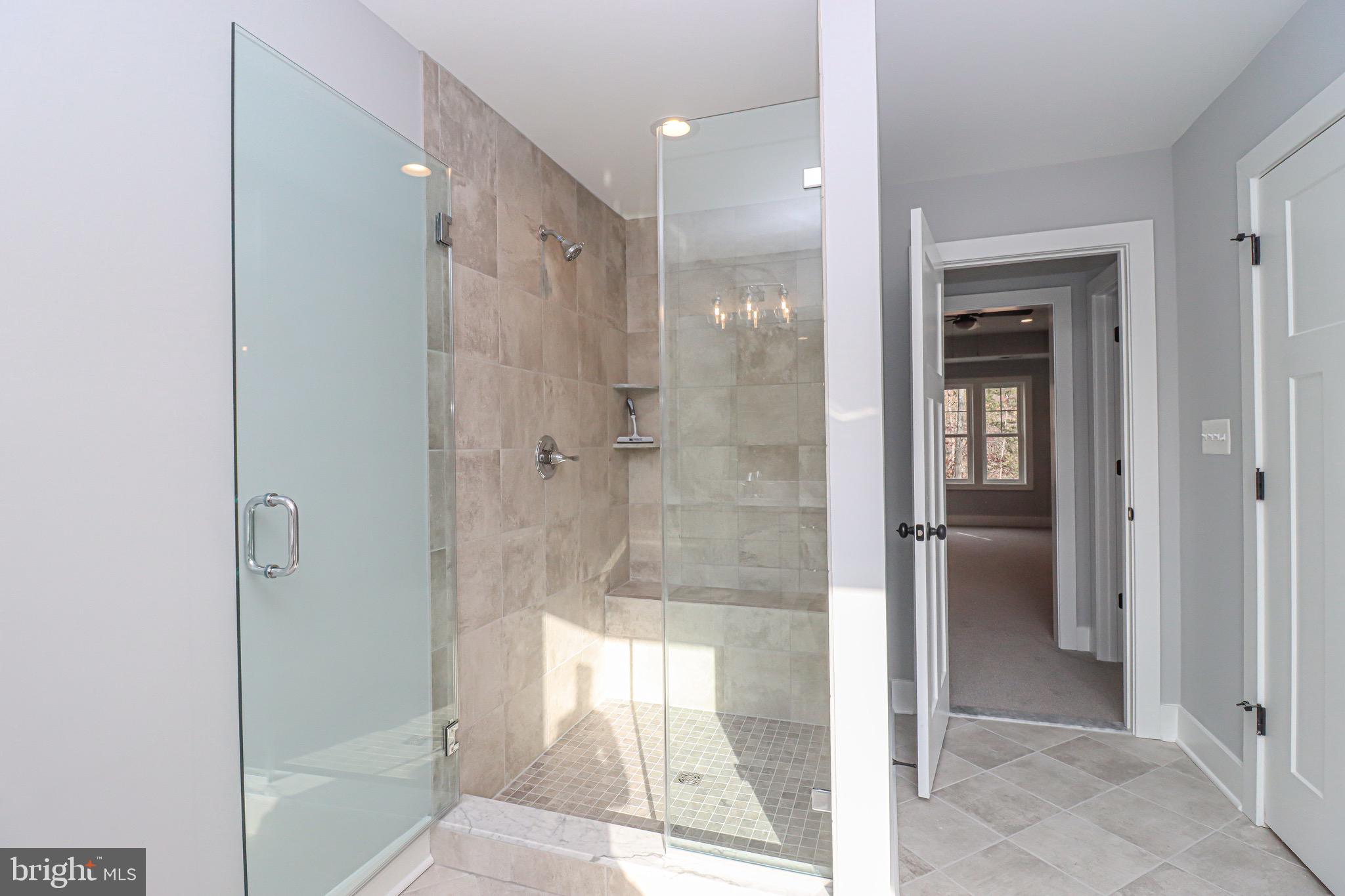 1305 Polyanski Drive Pasadena, MD 21122 - Photo 38 of 50 Tile Shower with Framless Doors