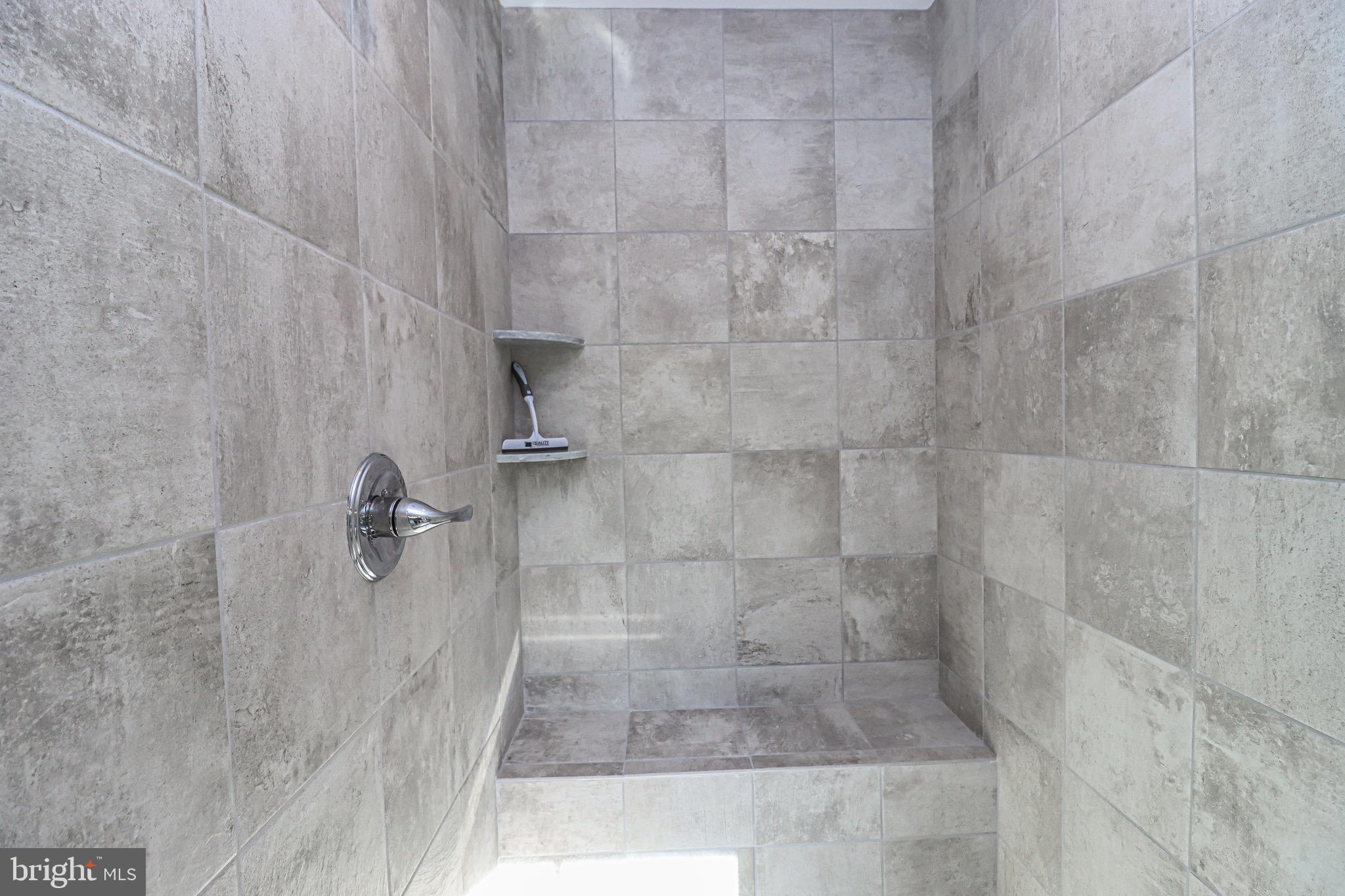 1305 Polyanski Drive Pasadena, MD 21122 - Photo 39 of 50 Bench Seat in Shower