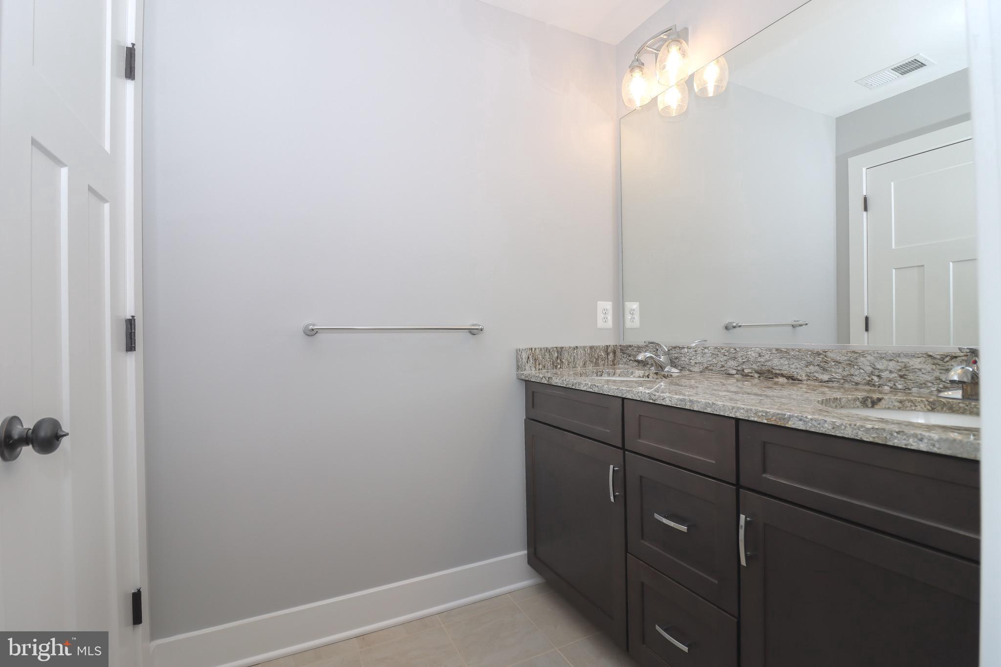 1305 Polyanski Drive Pasadena, MD 21122 - Photo 42 of 50 Upper Level Hall Bath