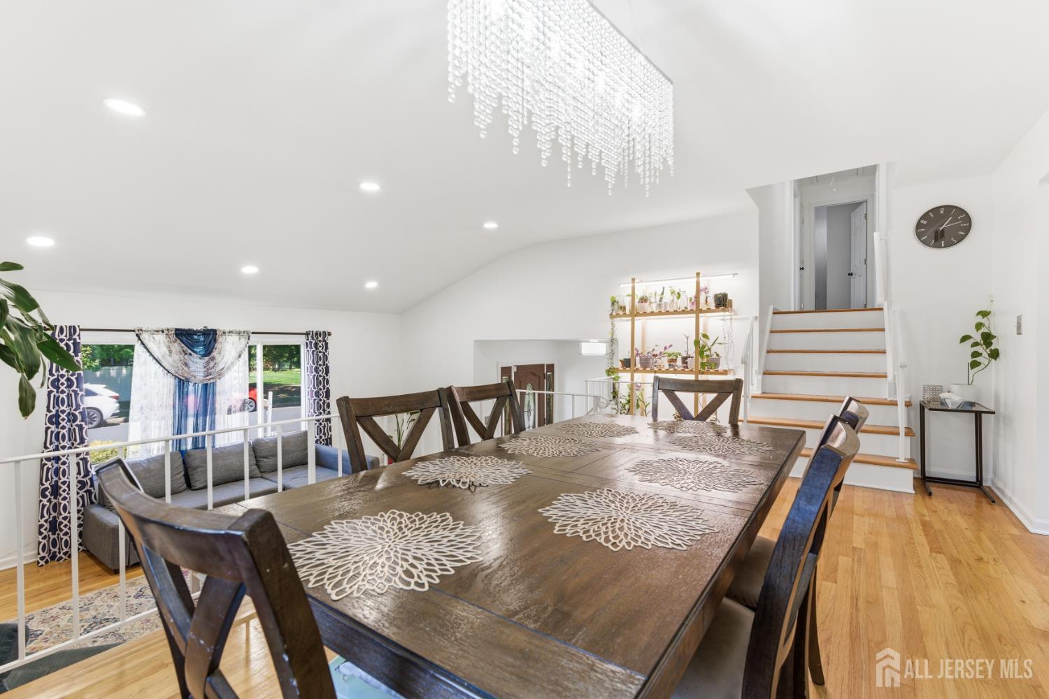 213 Normandy Road Edison, NJ 08820 - Photo 20 of 45 a dining room with furniture and wooden floor