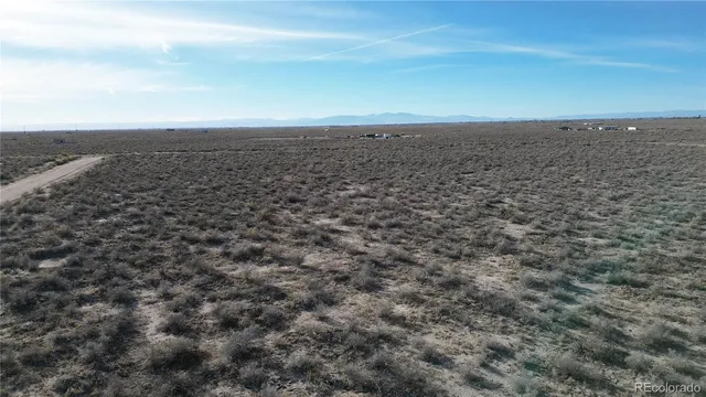 an aerial view of beach and city