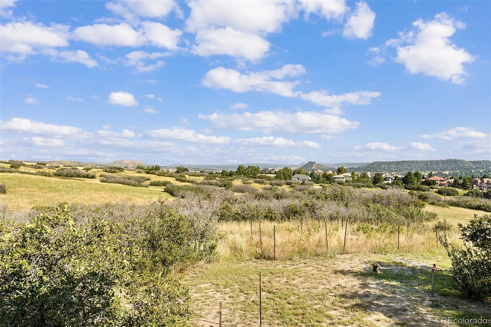 2135 Haystack Road Castle Rock, CO 80104 - Photo 2 of 35 a view of lake view and mountain