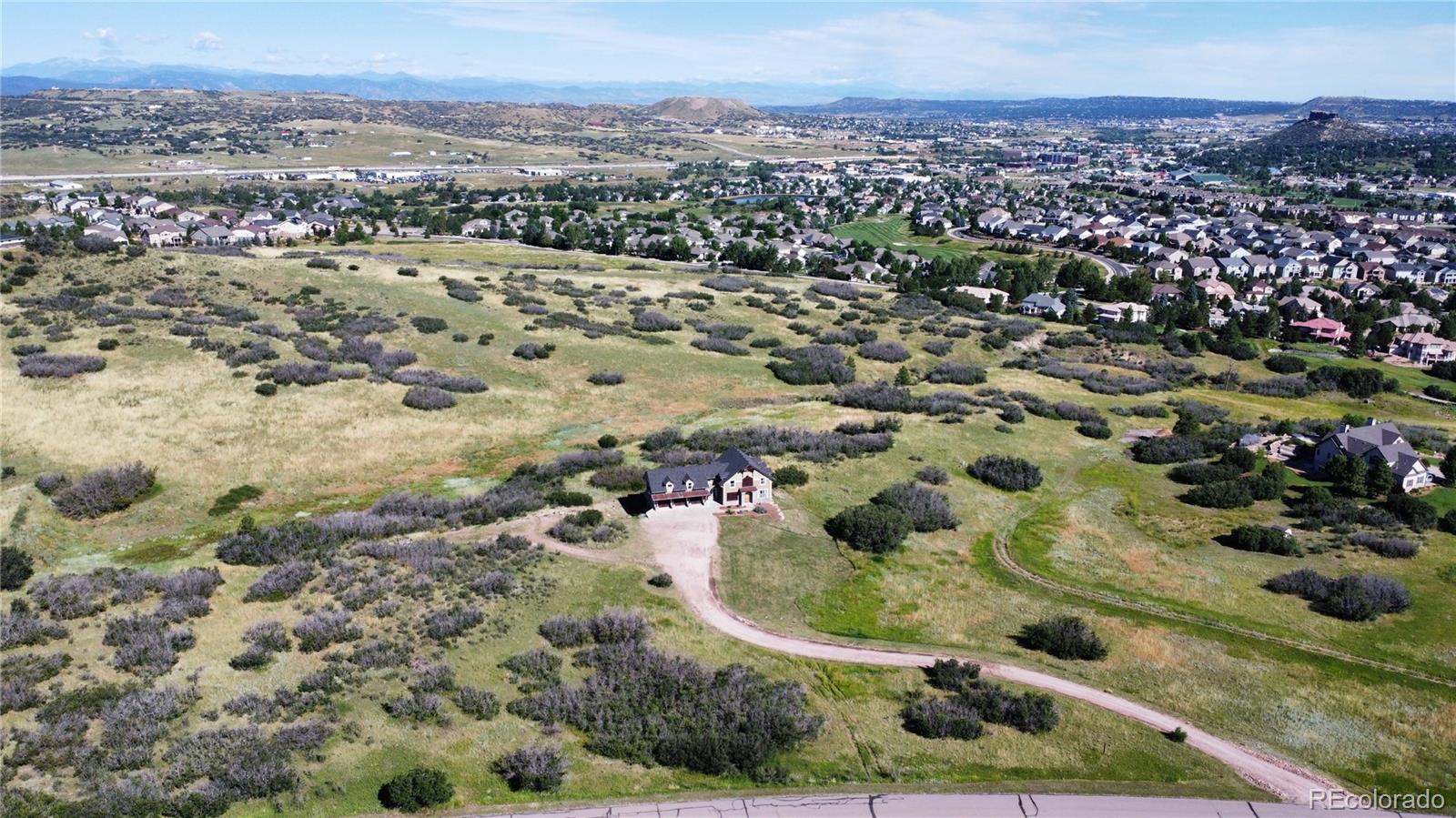 2135 Haystack Road Castle Rock, CO 80104 - Photo 3 of 35 an aerial view of residential houses with outdoor space