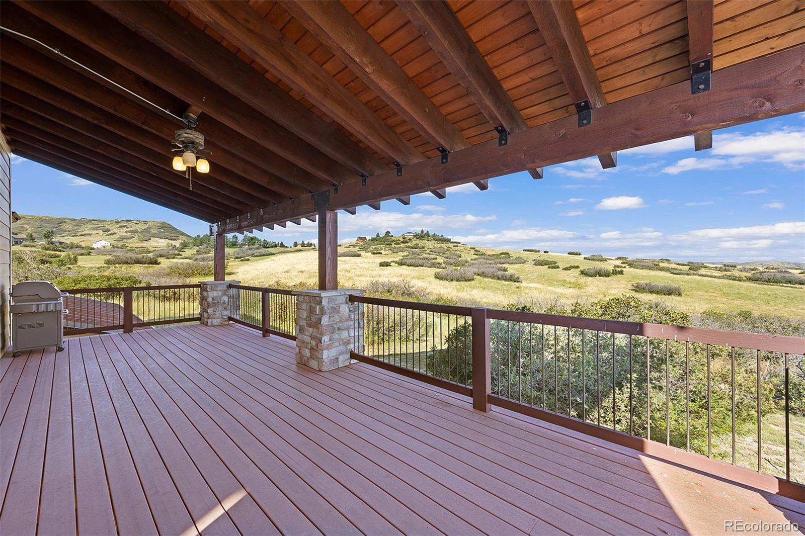 2135 Haystack Road Castle Rock, CO 80104 - Photo 31 of 35 a view of balcony with wooden floor